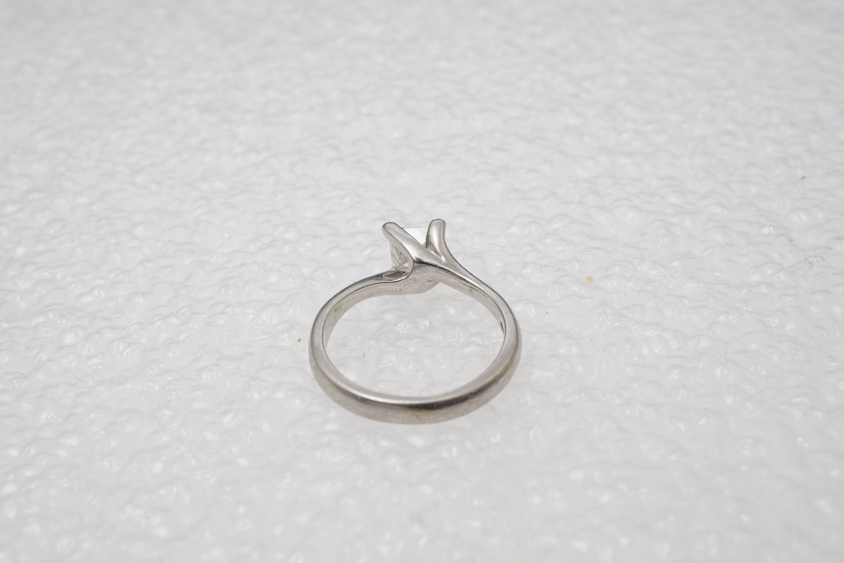 A diamond solitaire ring